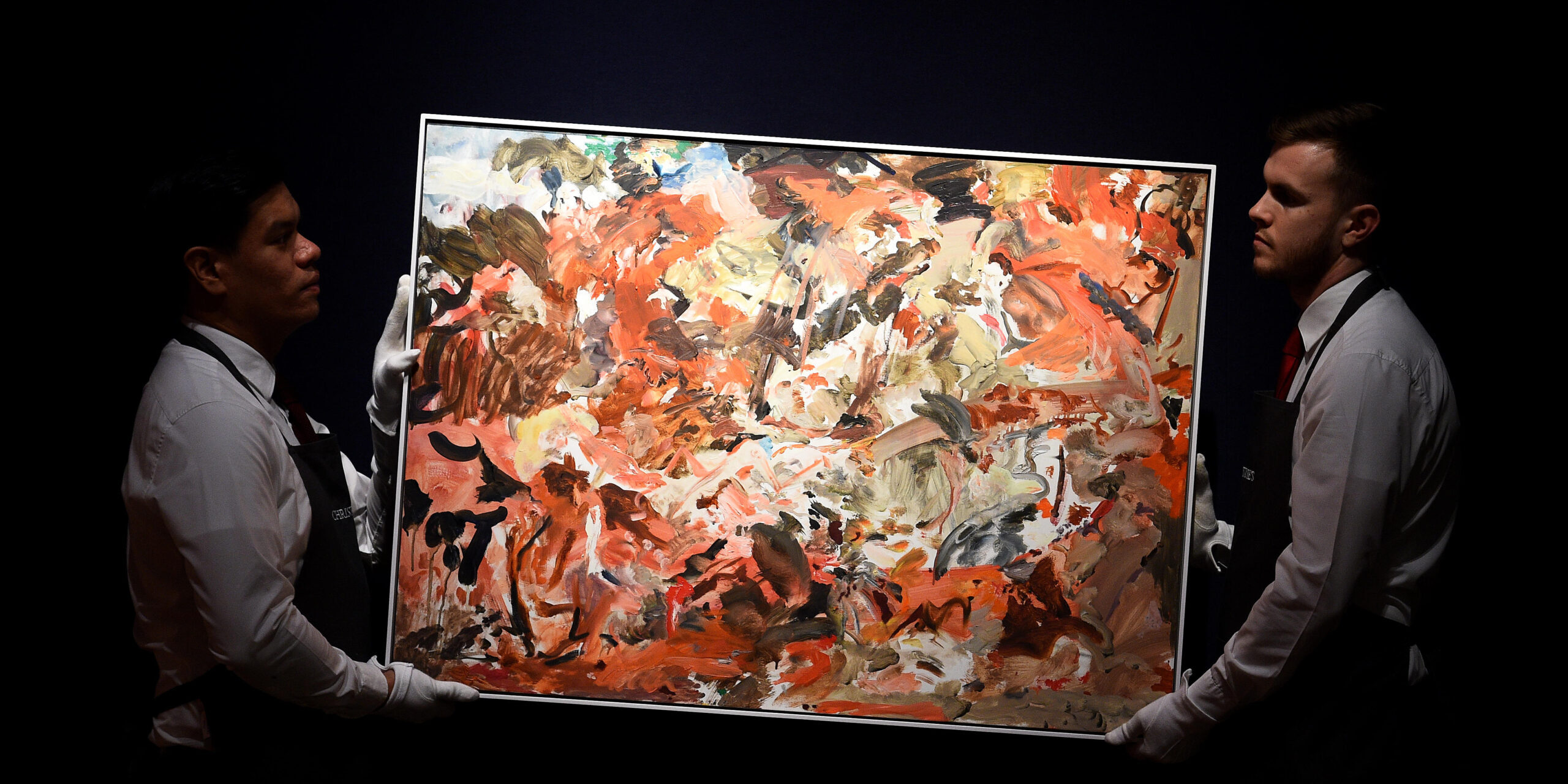 Art handlers adjust Yet to be titled by Cecily Brown. Courtesy of Alamy