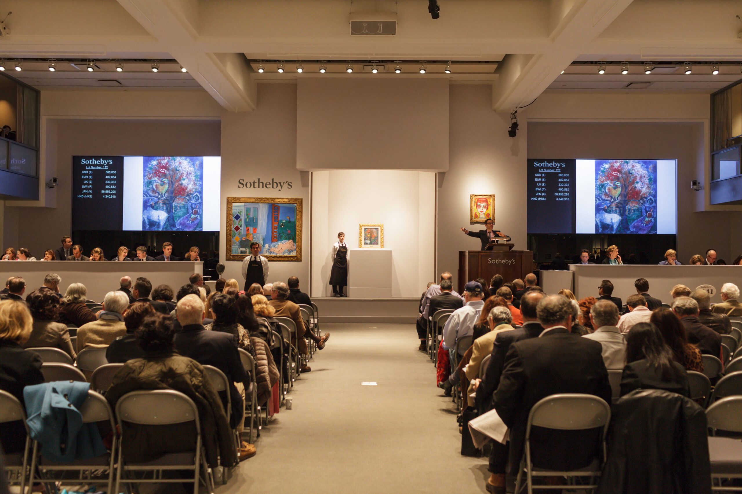 Art investing under way on a Chagall painting, Sotheby's fine art auction. Philip Scalia / Alamy Stock Photo