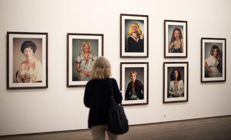 A woman looks at images by photographer Cindy Sherman in a gallery in Berlin, Germany, 14 September 2015. 65 photographs by the artist will be showcased in an exhibition entitled 'Cindy Sherman - Works from the Olbricht Collection' starting on 16 September as part of the Berlin Art Week. Credit: dpa picture alliance/Alamy Live News