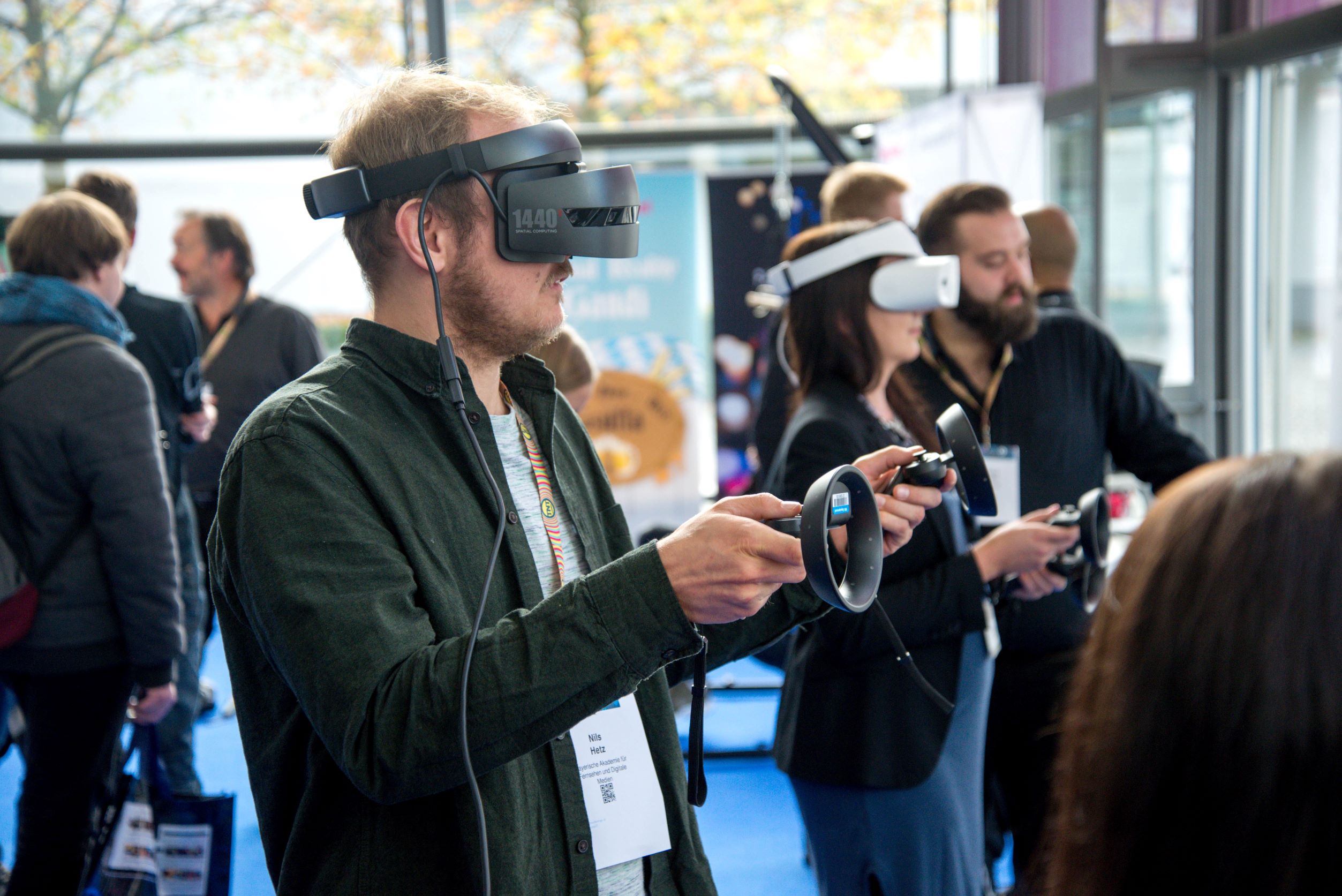 Image of man using VR hardware in München, Germany. Photo by Stephan Sorkin on Unsplash