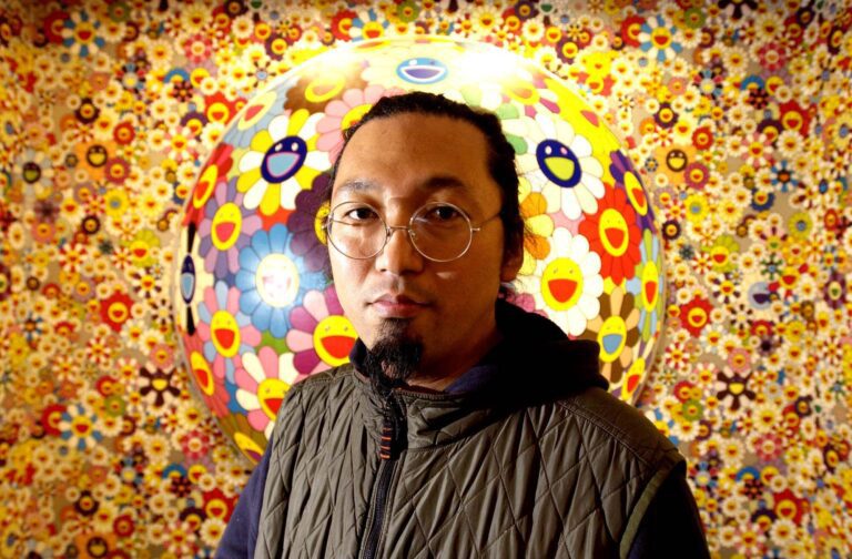 Contemporary artist Takashi Murakami with his work at the Serpentine gallery. Andy Paradise / Alamy Stock Photo