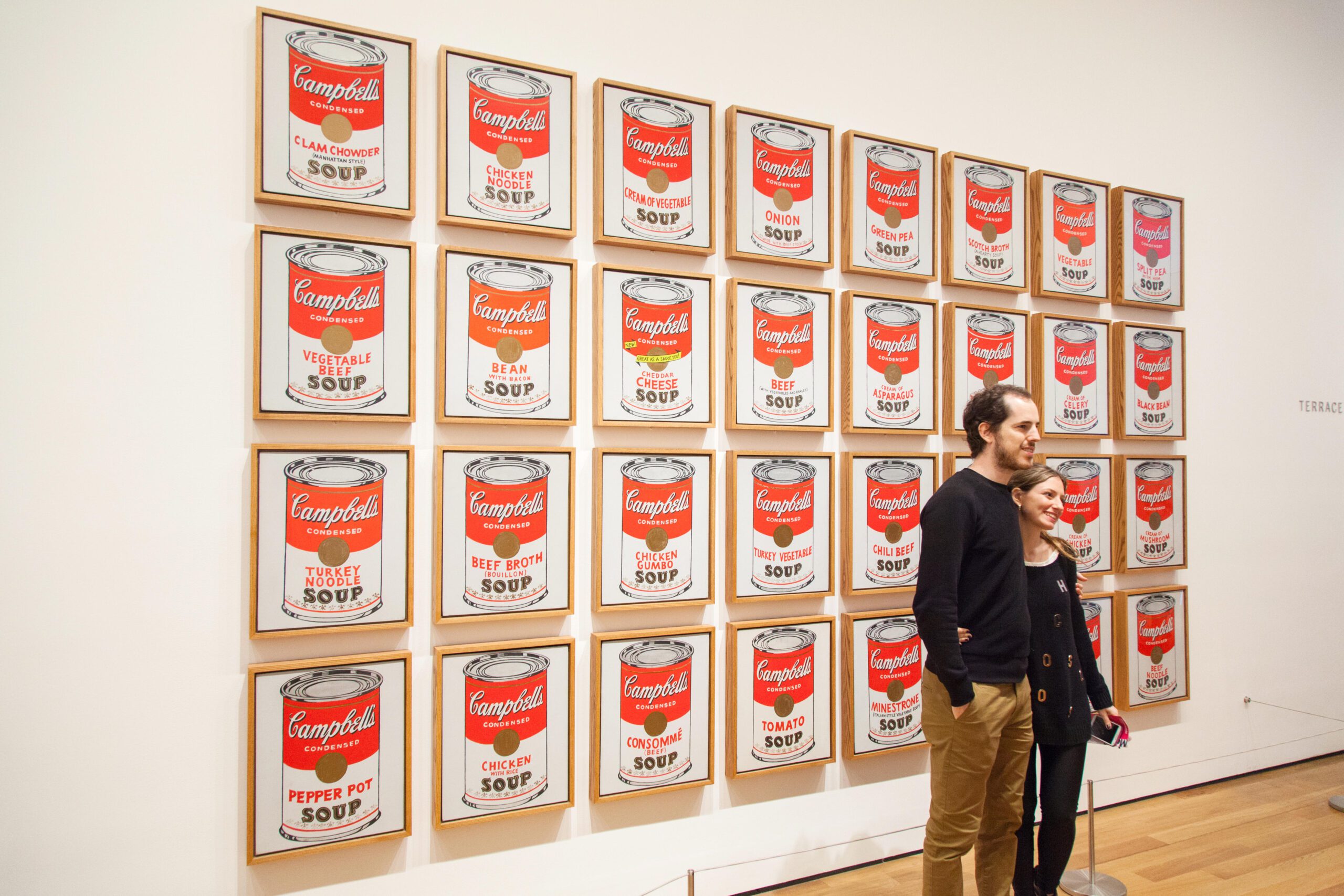 Visitors in front of Andy Warhol’s Cambells Soup Cans in the MoMA. Edd Westmacott / Alamy Stock Photo
