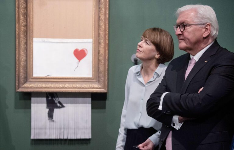 Stuttgart, Germany. 11th Apr, 2019. Federal President Frank-Walter Steinmeier and his wife Elke Budenbender are standing in the exhibition "Die jungen Jahre der Alten Meister. Baselitz - Richter - Polke - Kiefer", in the permanent exhibition of the Staatsgalerie in front of the work "Love is in the Bin" from the year 2018 by Banksy. Credit: Marijan Murat/dpa/Alamy Live News