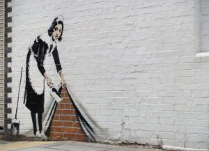 Banksy stencil graffiti, maid cleaner, London Courtesy of Alamy